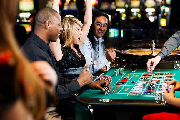 Mobile phone showing yotogel app interface with live casino tables